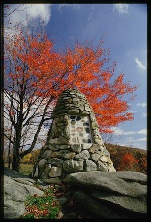 Cairn with fall leaves