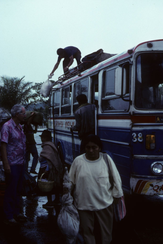 Unloading packages at a bus stop