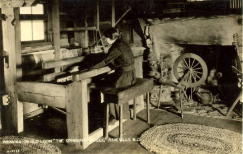 Weaving on an old wooden loom