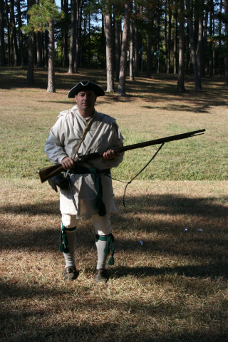 Regulator re-enactor with musket