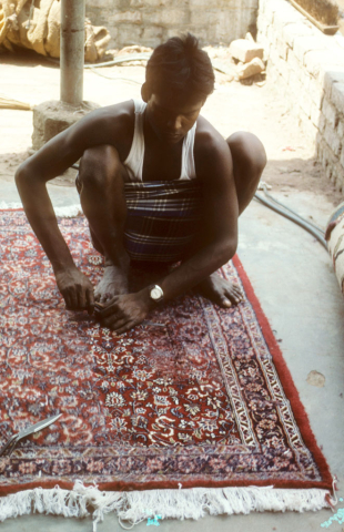 Carpet clipper in Agra, India