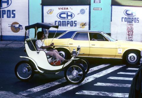 A small electric car on the streets of Guadalajara