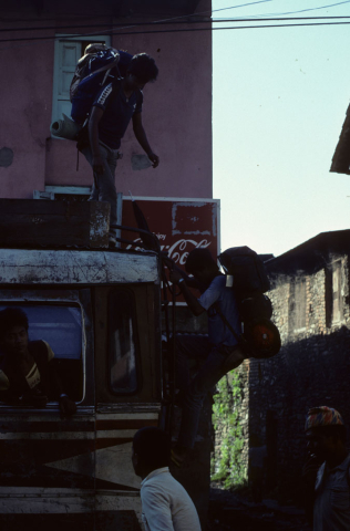 Loading trekking gear on a bus in Pokhara, Nepal