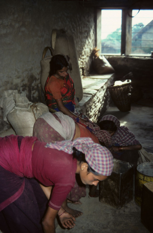 Women at a grain mill