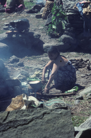 A pilgrim woman cooking 