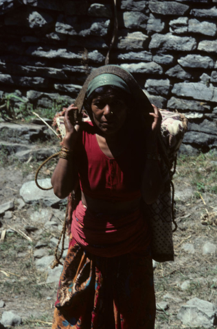 Woman in Nepal with bamboo basket