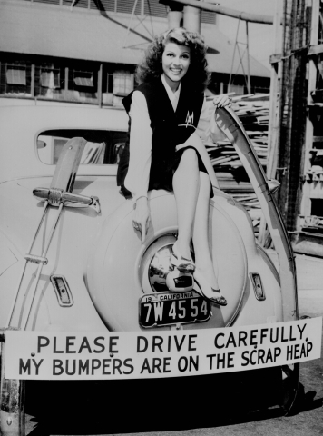 Rita Hayworth promoting scrap metal drives