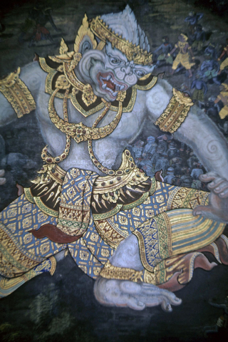 Monkey god Hanuman in giant form kneeling (Thai Ramayana mural)