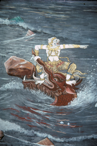 Hanuman wrests stone from sea dragon's mouth (Thai Ramayana mural)