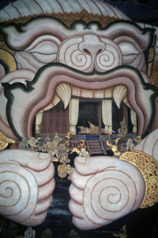 Paws and head of giant Hanuman cover pavillion to protect Rama (Thai Ramayana mural)