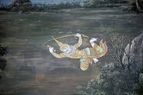 Hanuman flies carrying Ravana's soul container and golden bow (Thai Ramayana mural)