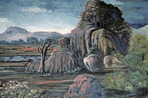 Rural landscape with mountains, trees, fields, and river (Thai Ramayana Mural)