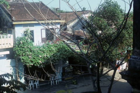 Elevated street view of houses and closed cafe in Hoi An