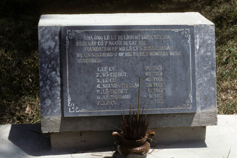 Stone monument on house foundation of family killed at My Lai