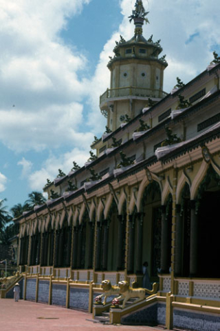 Long side portico and front turret of Cao Dai temple at Tay Ninh