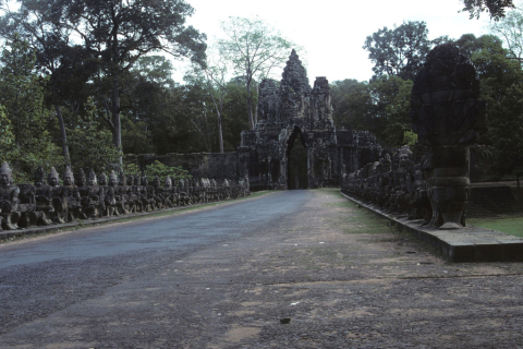 Mythic statues line causeway to south gate of Angkor Thom or Great City