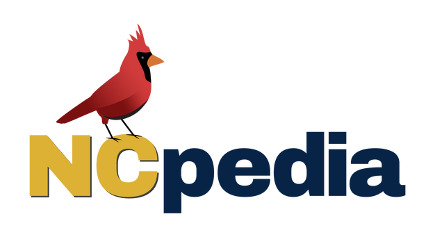 A cardinal sits on a large block of text that reads "NCpedia."