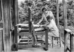 A weaver works at a loom at Penland School of Crafts, 1930. Photograph by Bayard Wootten. North Carolina Collection, University of North Carolina at Chapel Hill Library.