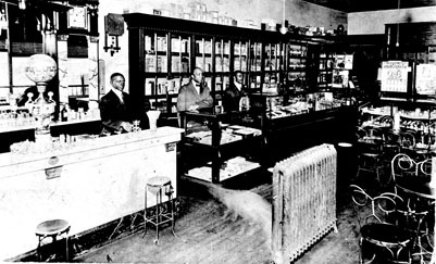 Interior, YMI Drug Store, Ahseville, NC, 1910. From the General Negative Collection, North Carolina State Archives, call #:  N_79_9_27.